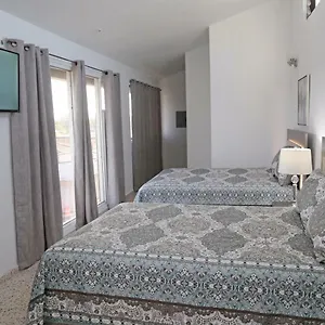 https://itza-bella-suites.comcaribbean.com